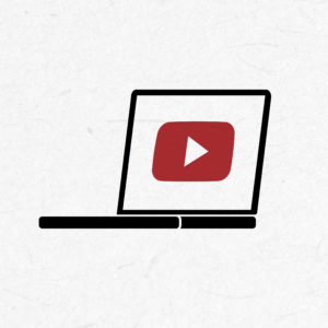 Ein Laptop, darauf das YouTube-Logo.